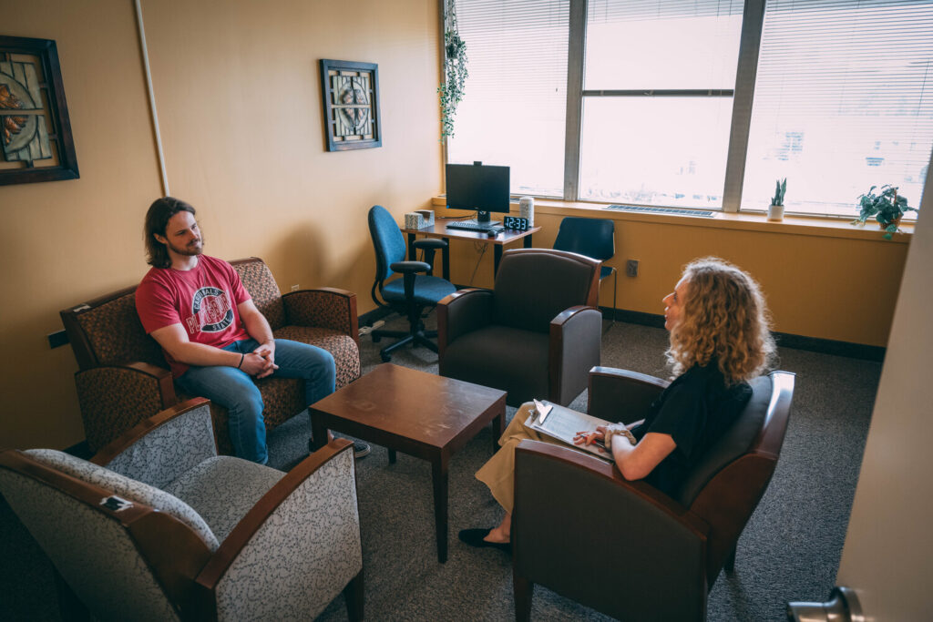 Client and therapist in clinic setting