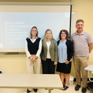 Taylor Wood after defending her thesis with her committee members